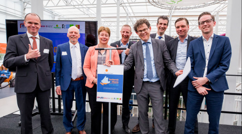Verschillende vertegenwoordigers van de visie staan naast elkaar op een rij